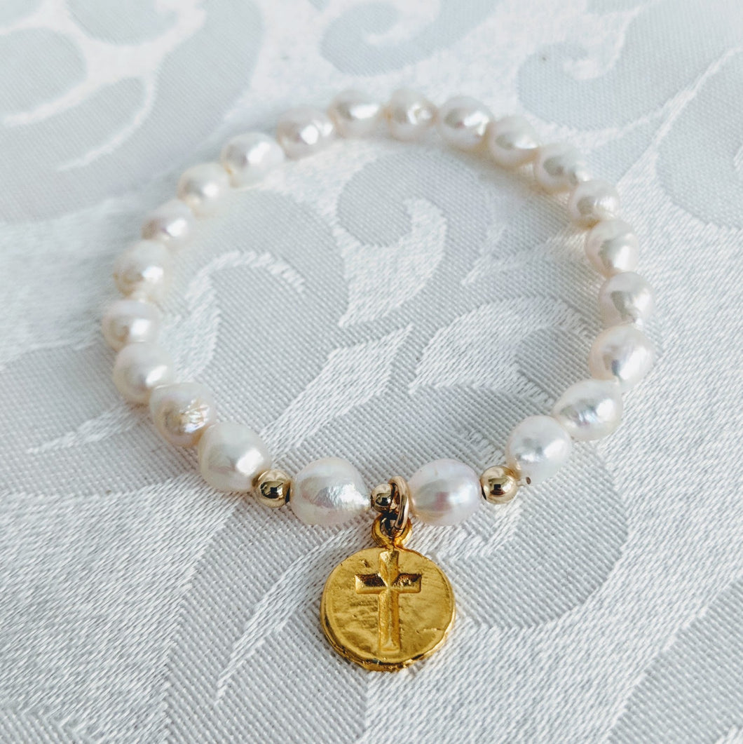 Baby pearl bracelet with on sale cross